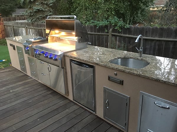 Deck with built outlet in grill