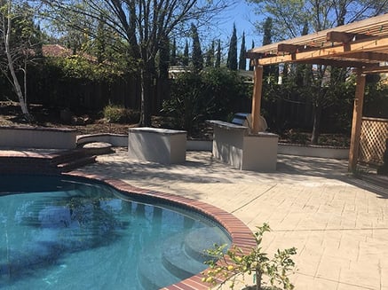 Pergola and landscaping in backyard