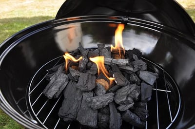 Charcoal grill with flames