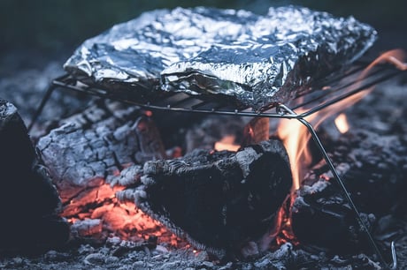 Roasting treats over a backyard fire