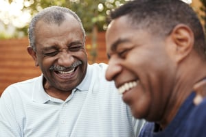 Father and son in outdoor kitchen